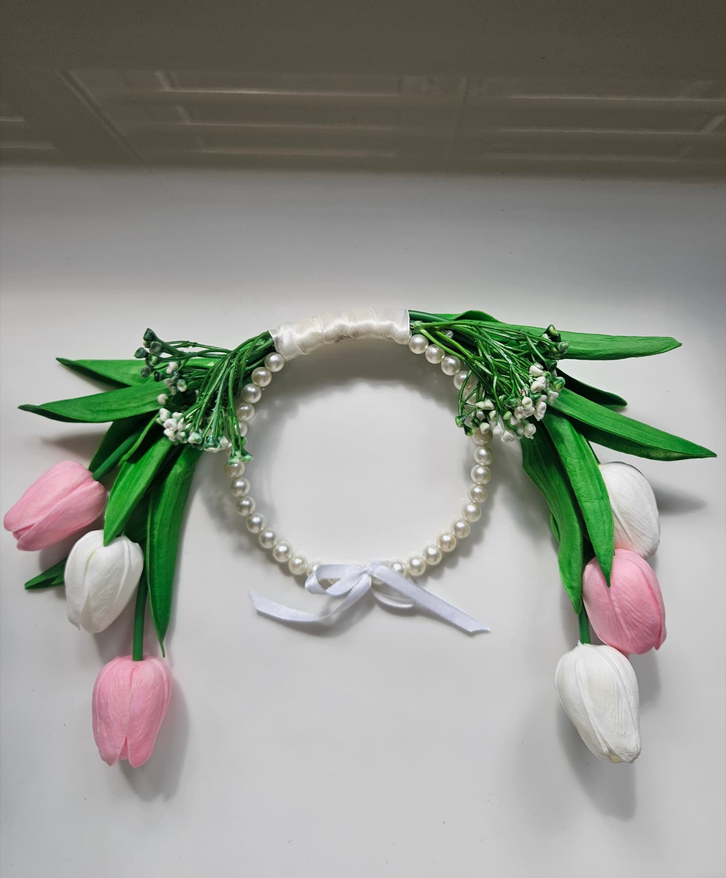 Pearl ring bouquet of pink and white tulips